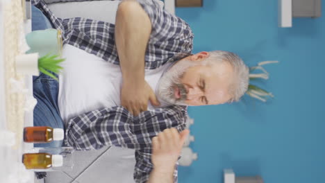 Vertical-video-of-Old-man-with-itchy-armpits.-Fungus-Problem.